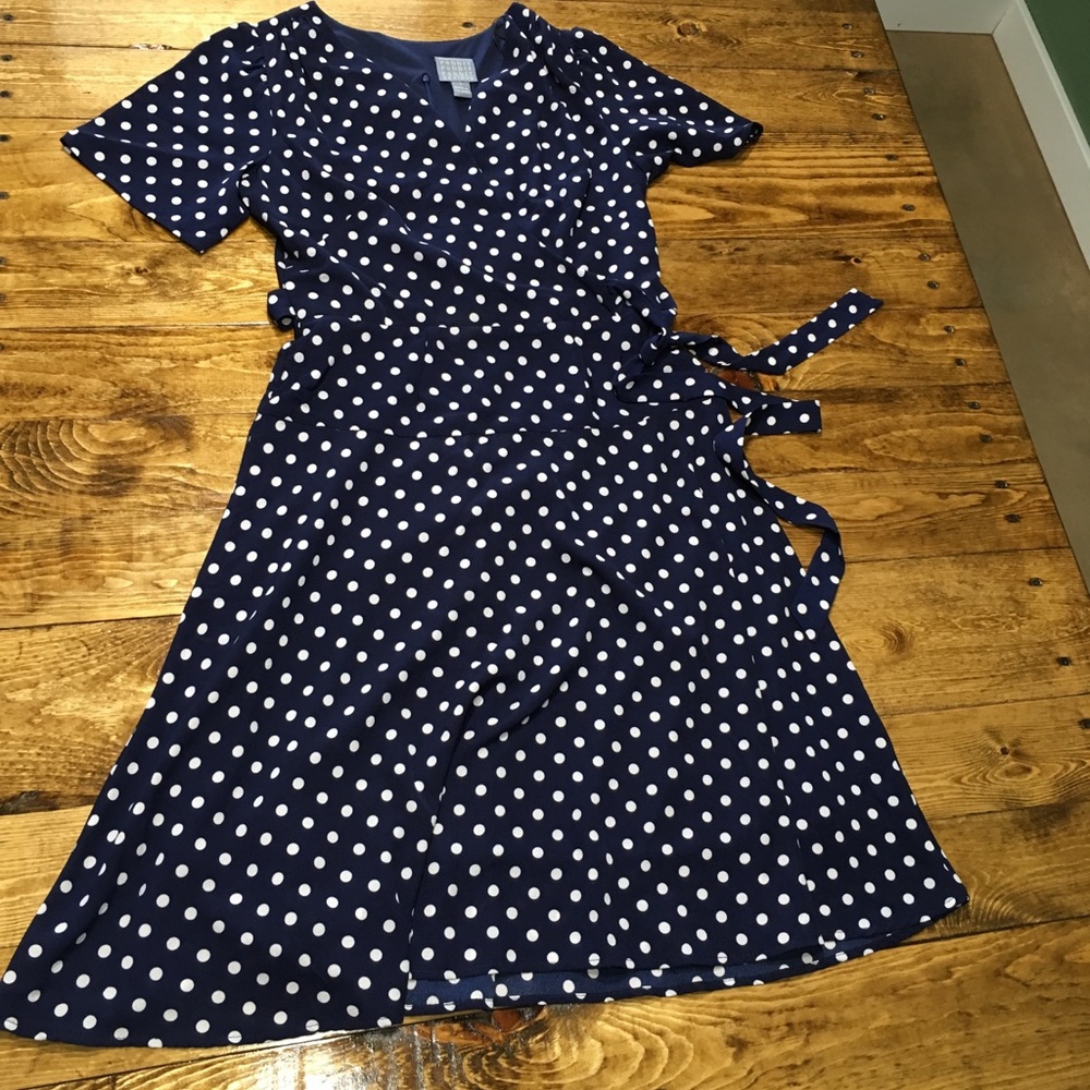 Navy blue polka dot mock wrap dress